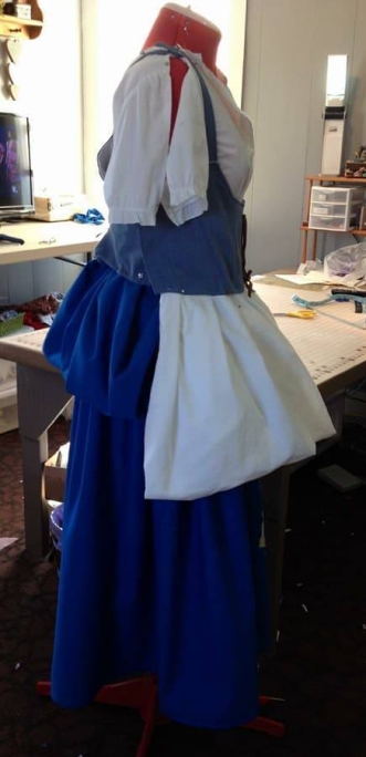 blue "pouch" with white apron